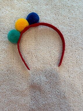 Matilda Jane Red Headband with Green, Yellow & Blue Pom Poms